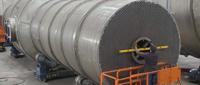 Alloy heat exchanger shell in fabrication