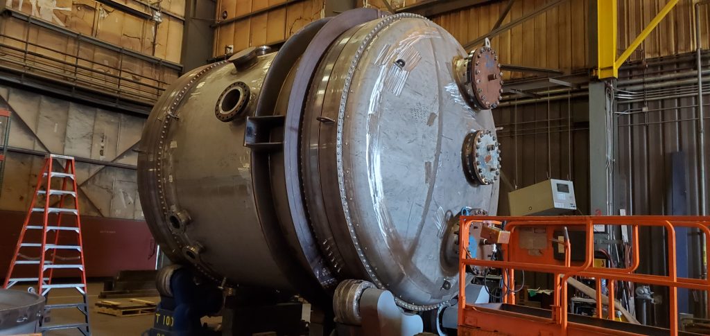 Large-diameter fabricated process vessel with bolted girth flange in the Harris Thermal shop