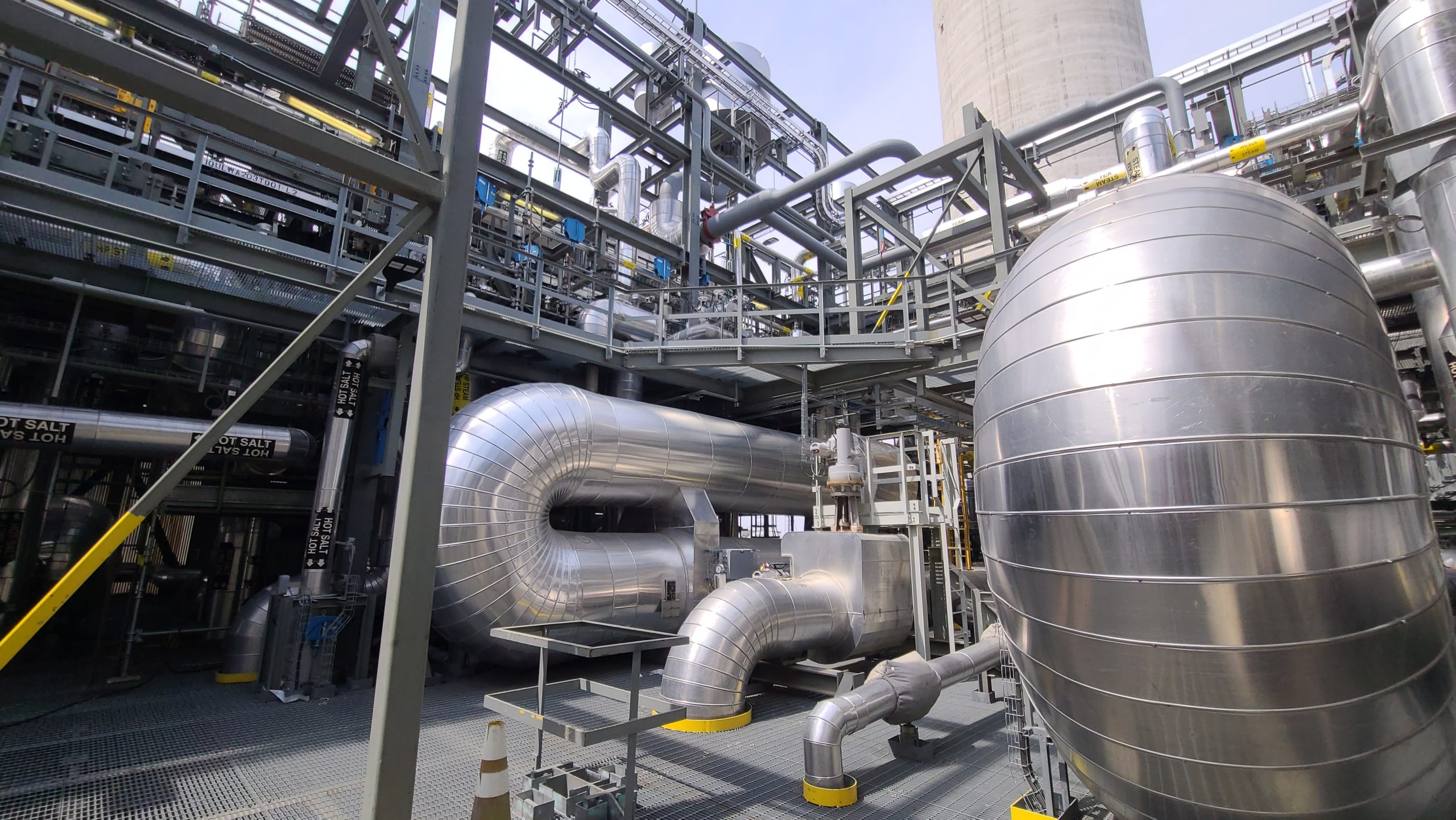 Insulated process piping and vessels at a power generation facility